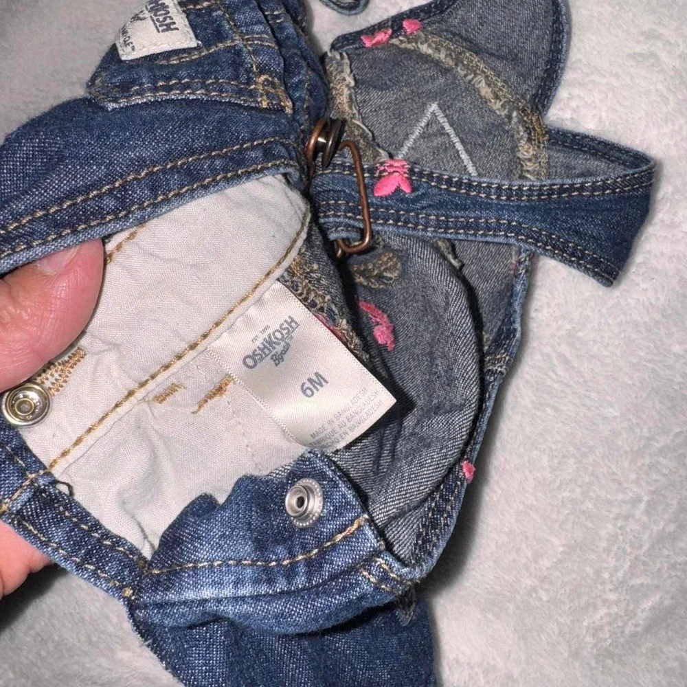 OshKosh B'gosh blue denim overalls with pink butterfly embroidery Size 6 month